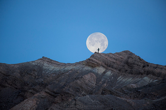 PHOTOGRAPHER AND FULL MOON